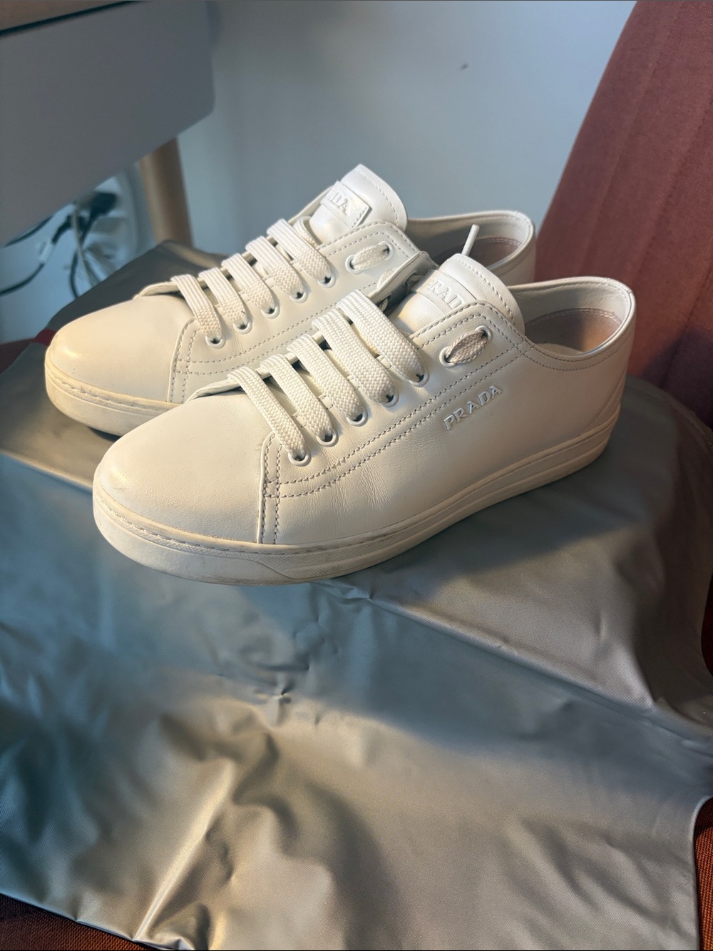 Prada women’s Low-Top Sneakers in Cream white